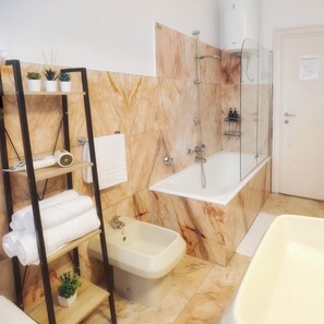 Hair dryer, bidet, towels, soap