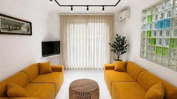 Superior Apartment, Balcony | Living area