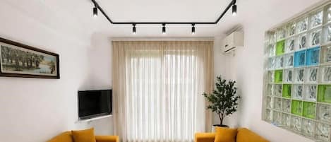 Superior Apartment, Balcony | Living area