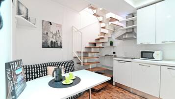 Comfort appartement, uitzicht op stad | Woonruimte | Een flatscreentelevisie