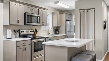 Condo, Multiple Beds, Balcony, Mountain View (Modern Comfort Retreat) | Private kitchen | Fridge, microwave, oven, stovetop