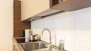 Leilighet, 4 soverom, balkong | Eget kjøkken | Espressomaskin, kaffetrakter/tekoker, kjøleskap og ovn