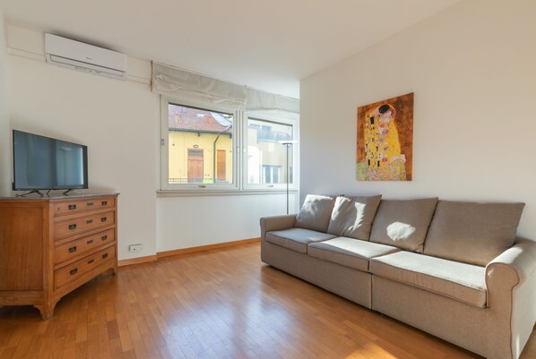 Apartment, 4 Bedrooms, Balcony | Living area | 32-inch flat-screen TV with cable channels - Welcoming Flats by Lake Como (Como)