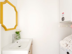 Apartment, City View | Bathroom | Hair dryer, towels