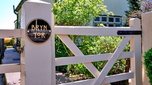 A white gate with a sign that reads "BRYN TOR". - Bryn Tor (Bolsover)