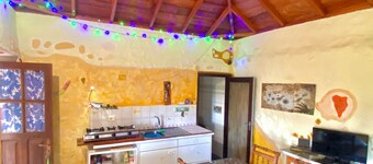Casita Mazo, 1 bedroom, living with sofabed and kitchen bar, bathroom