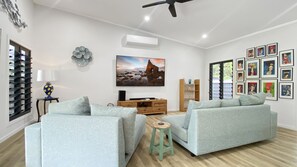 TV - White Pandanus, A beautifully styled beach house nestled in the peaceful charm of Magnetic Island (Horseshoe Bay)