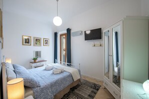 2 habitaciones, tabla de planchar con plancha, wifi y ropa de cama 