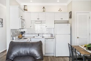 Condo, 1 King Bed with Sofa bed, Balcony, Garden View (Sweet Serenity) | Private kitchen | Fridge, microwave, oven, stovetop