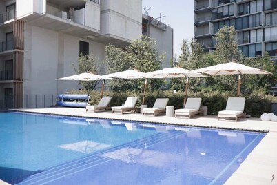 City-view 1BR w/ pool & free parking
