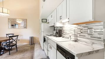 Condo, Multiple Beds, Balcony, Garden View (Warm Welcome Getaway) | Private kitchen | Fridge, microwave, oven, stovetop