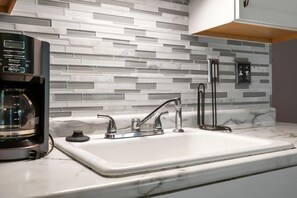 Condo, Multiple Beds, Balcony, Garden View (Warm Welcome Getaway) | Private kitchen | Fridge, microwave, oven, stovetop