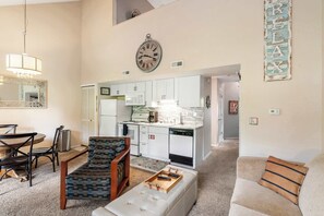 Condo, Multiple Beds, Balcony, Garden View (Warm Welcome Getaway) | Living area | 42-inch flat-screen TV with digital channels