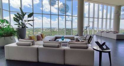 2BR retreat close to Colomos w/ gym