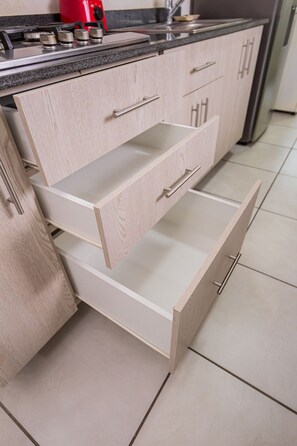 Fridge, microwave, cookware/dishes/utensils