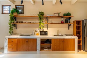 Fridge, microwave, oven, cookware/dishes/utensils