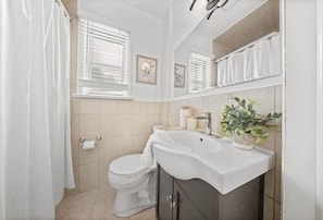 Hair dryer, towels, soap, toilet paper