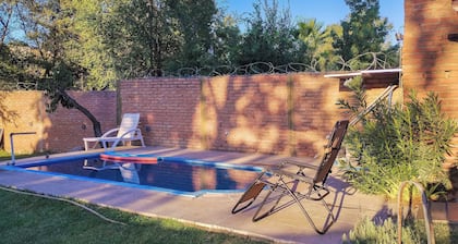 Nancy and Carlos's house, view of the mountains, swimming pool and barbecue area.