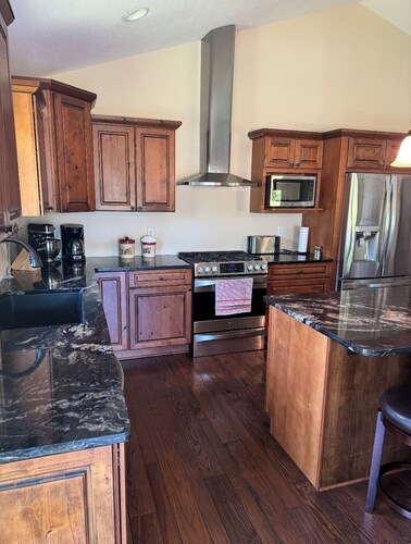 Lake House with Hot Tub, game room, huge yard, 1 mile from Silverlake Sand Dunes