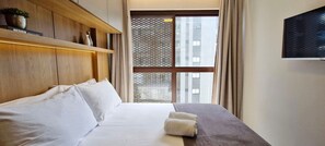 1 غرفة نوم ومكواة/لوح كي وخدمة الإنترنت وملاءات أسرّة