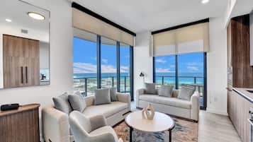 Luxury Condo, 4 Bedrooms, Ocean View | Living area | Smart TV