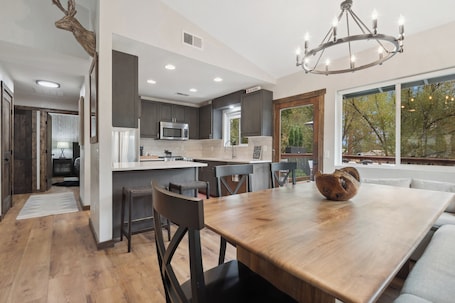 Dining. Whitefish Home Sleeps 14 Near Glacier Hot Tub • Game Room • Fire Pit • Bunk Room