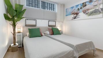 1 dormitorio, tabla de planchar con plancha, wifi gratis y ropa de cama