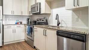 Fridge, dining tables - Landing | Spectacular 1BD, Pool, Courtyard (Melbourne)