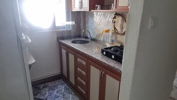 Apartment, 2 Bedrooms, Balcony, Sea View | Private kitchen | Full-size fridge, stovetop, cookware/dishes/utensils