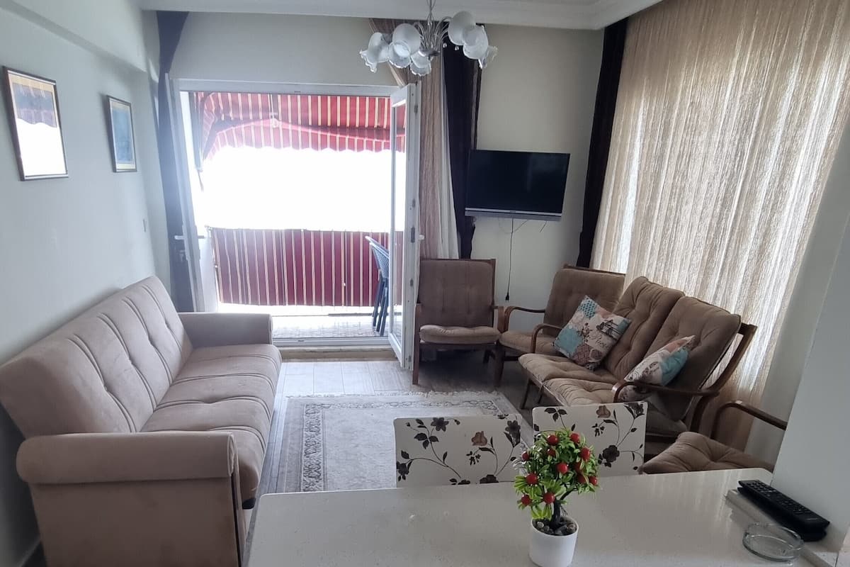 Apartment, 1 Schlafzimmer, Balkon, Meerblick | Wohnbereich
