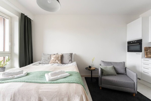 1 bedroom, desk, iron/ironing board, travel crib