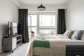 1 bedroom, desk, iron/ironing board, travel crib