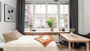 1 bedroom, desk, iron/ironing board, travel cot