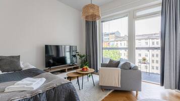 1 bedroom, desk, iron/ironing board, travel crib