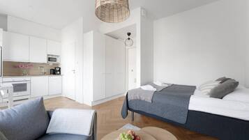 1 bedroom, desk, iron/ironing board, travel crib