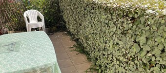 T2 garden floor small residence private parking near large beach and shops
