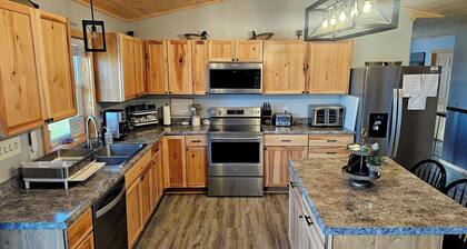 Spacious 5-bedroom Osakis lakefront house/guest house with dock, WiFi, AC, spa