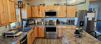 Spacious 5-bedroom Osakis lakefront house/guest house with dock, WiFi, AC, spa