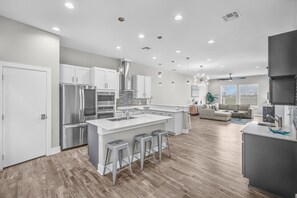 House, Multiple Beds, Pool Access (Cabana Cove Retreat Unit C) | Private kitchen | Fridge, microwave, oven, stovetop - Waterfront Condo With Rooftop + Pool + Boat Slips (Corpus Christi)