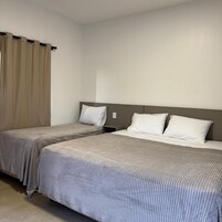 Basic Triple Room, Lanai, Courtyard View | Desk, laptop workspace