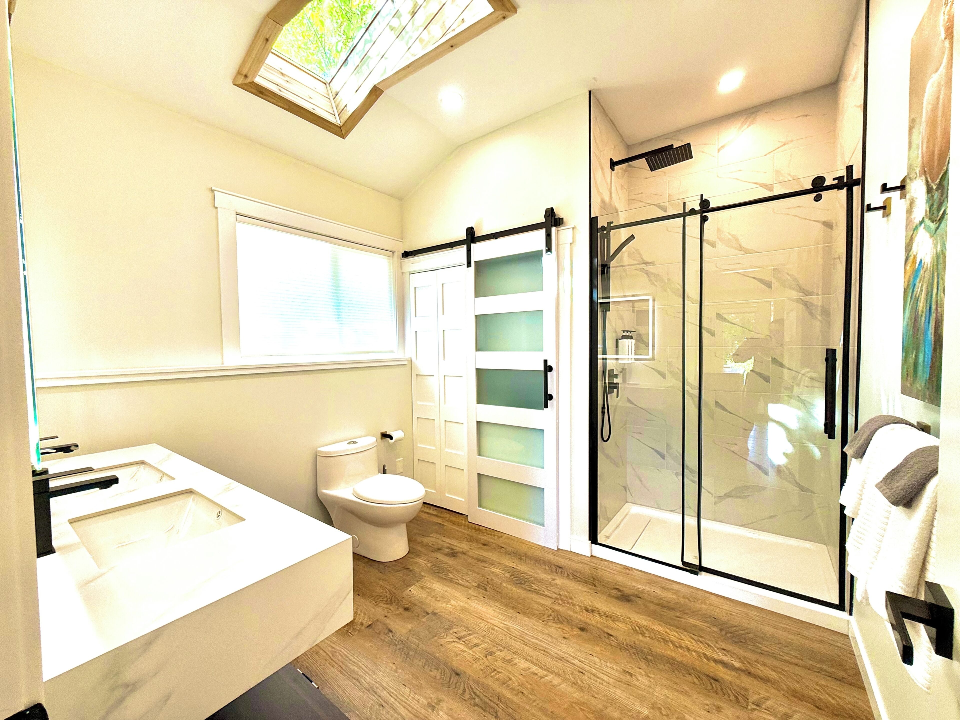 Shower, hair dryer, towels, soap