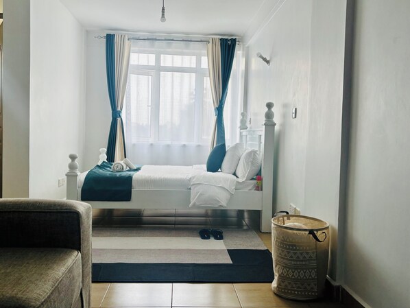 1 غرفة نوم ومكواة/لوح كي وواي فاي وملاءات أسرّة