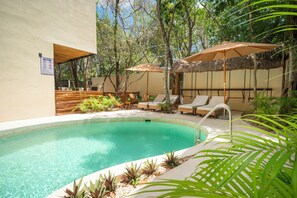 Outdoor pool, free cabanas, pool umbrellas