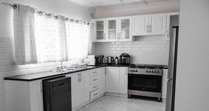 Serene four bedroom family home within walking distance of local amenities.