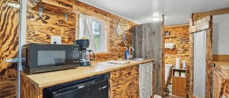 Fridge, microwave, coffee/tea maker, toaster