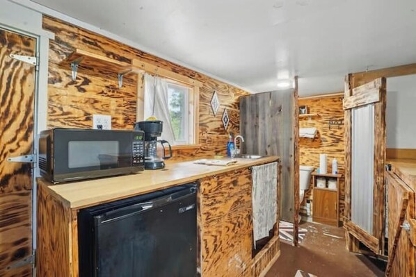 Fridge, microwave, coffee/tea maker, toaster