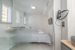 Apartamento | 3 dormitorios y tabla de planchar con plancha