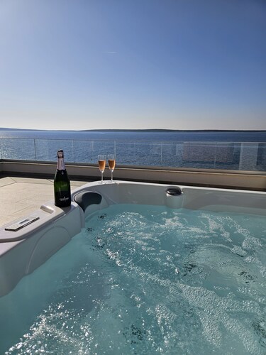 Luxury loft beachfront apartment with jacuzzi, big seaview terrace in Mandre