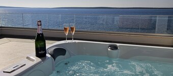 Luxury loft beachfront apartment with jacuzzi, big seaview terrace in Mandre