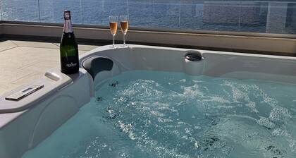 Luxury loft beachfront apartment with jacuzzi, big seaview terrace in Mandre